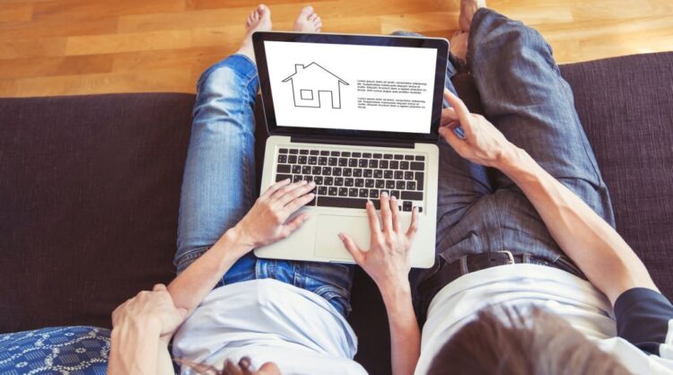 young family couple choosing new home online, search real estate to buy or rent, house for sale on screen of computer